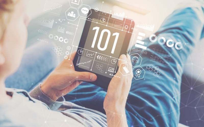 101 with man using a tablet in a chair