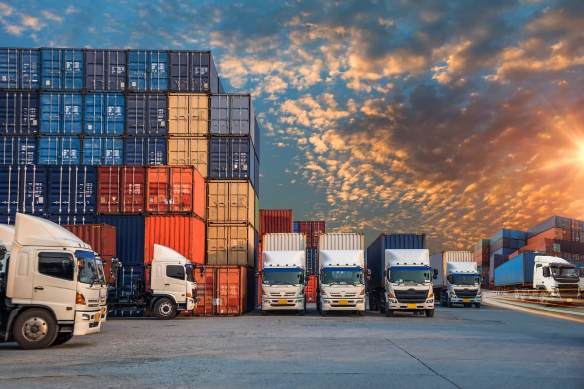 Stacks of freight containers preparing to be shipped by trucks